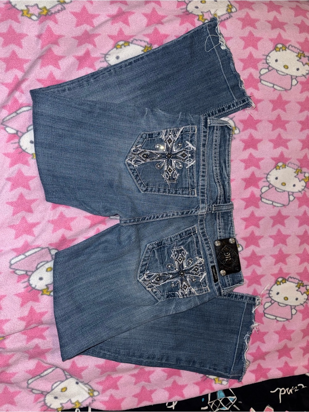 Miss Me low rise flare jeans with cross embroidery on back pockets, size 29